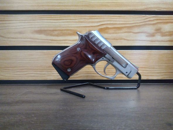 USED IN GOOD CONDITION / Taurus PT-22 22LR Rimfire Pistol with Rosewood Grips and Gold Accents